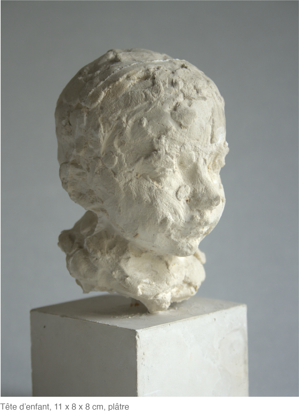 Tête d’enfant, 11 x 8 x 8 cm, plâtre