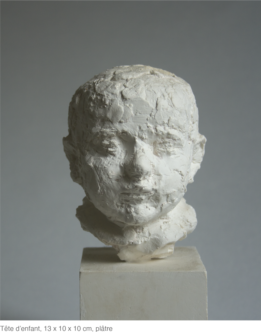 Tête d’enfant, 13 x 10 x 10 cm, plâtre